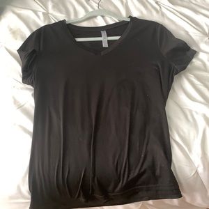 A v-neck tee, black, lightly worn, and soft